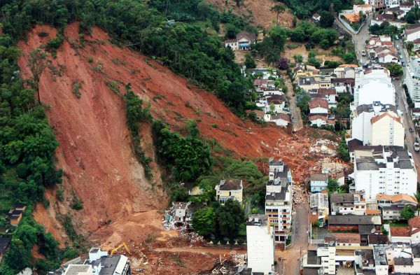 At least two dead and dozens missing after landslide engulfs motorway in  Brazil | World News | Sky News